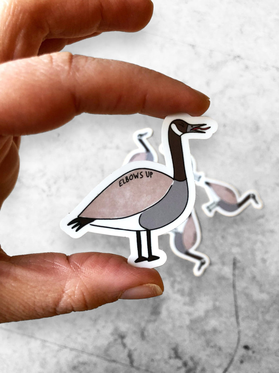 Elbows Up Canada Goose sticker, proudly Canadian-made with a touch of sass. Perfect for adding humour and Canadian pride to your laptop, water bottle, and more.