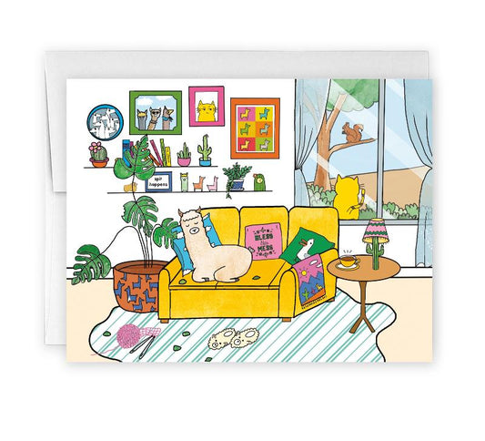 a colourful card, showing a busy living room scene with a llama napping on a yellow couch. there are various artworks on the wall, with green plants, slippers and knitting yarn on the floor. a yellow cat stands at the window, eyeing a squirrel on a tree branch seen through the window
