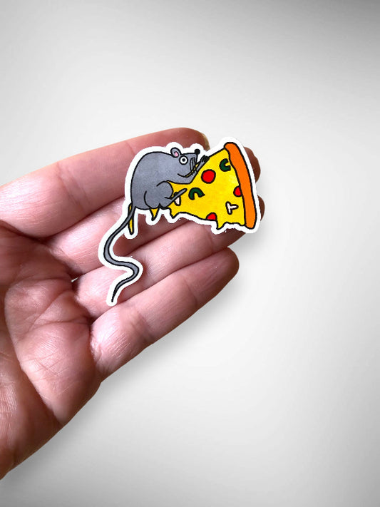vinyl sticker of a cute rat eating a slice of pizza, in hand to show scale