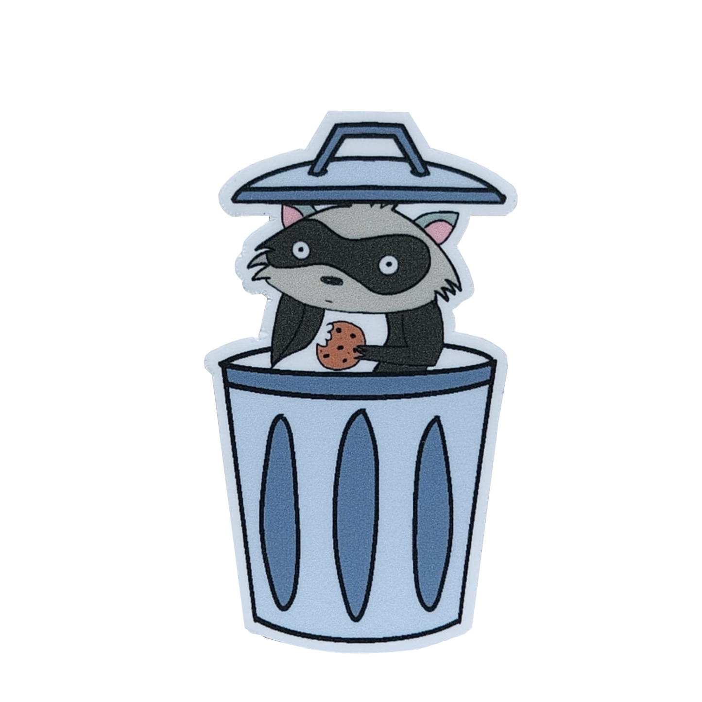 sticker of a raccoon in a trash can holding a cookie, on a white background