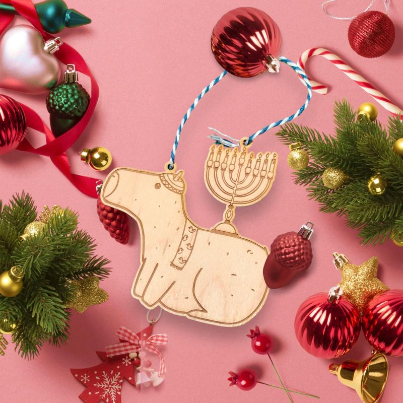 capybara hanukkah ornament against pink background