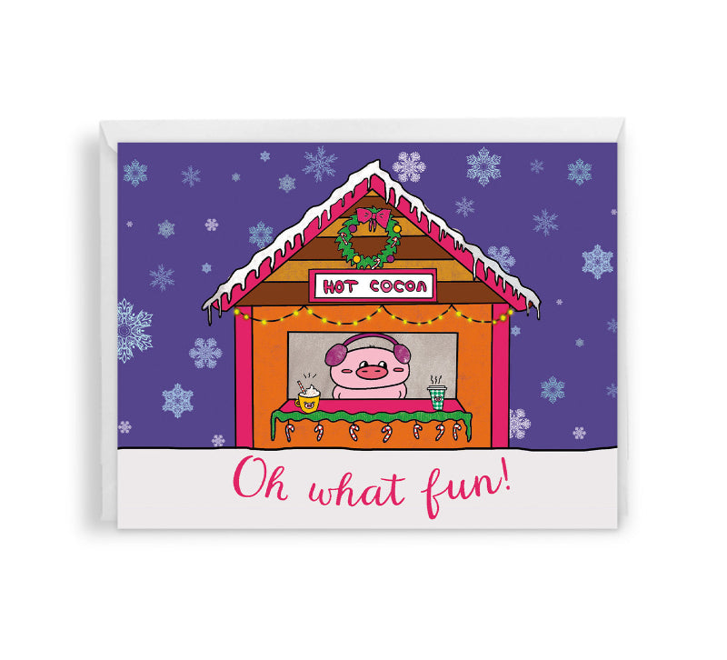holiday card with a cute cartoon pig in a hot cocoa stand and snowflake pattern on a purple background, with white envelope