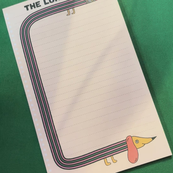 long list notepad showing a cute dachshund 
