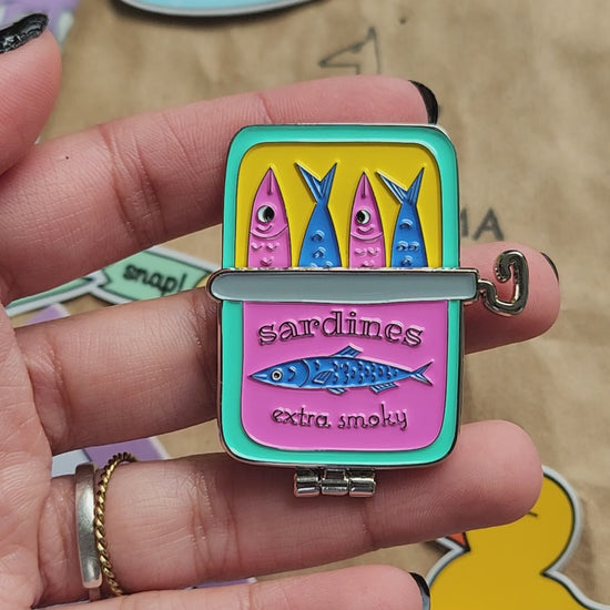 interactive sardine can pin. open the can to reveal some smoking fish.