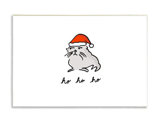 resentment seal in a santa hat, with text reading "ho ho ho"